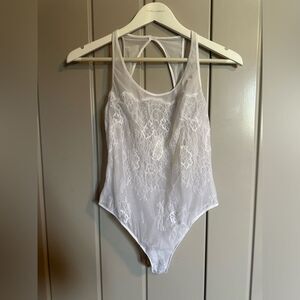 NWOT Jezebel white lace bodysuit size small